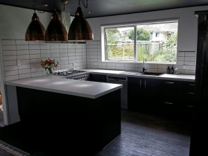 Black units with white benchtop